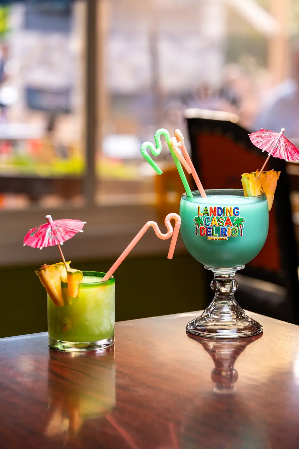 Branded fishbowl and a pineapple drink