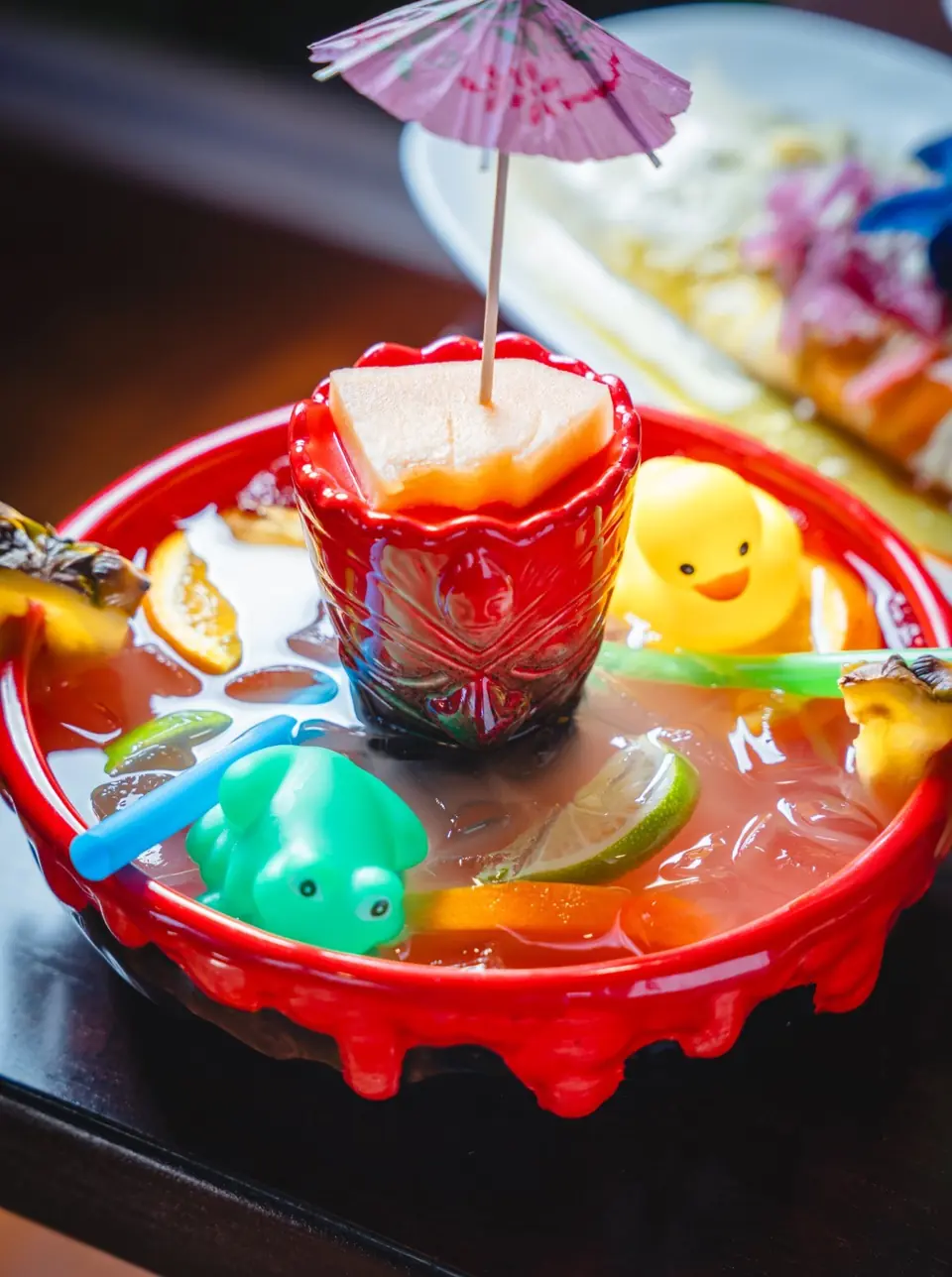 Cazuela De Rio with fruit and rubber ducks